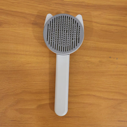 Reusable pet shedding needle comb